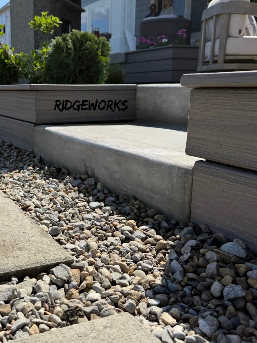 Composite trim meeting poured concrete step detail
